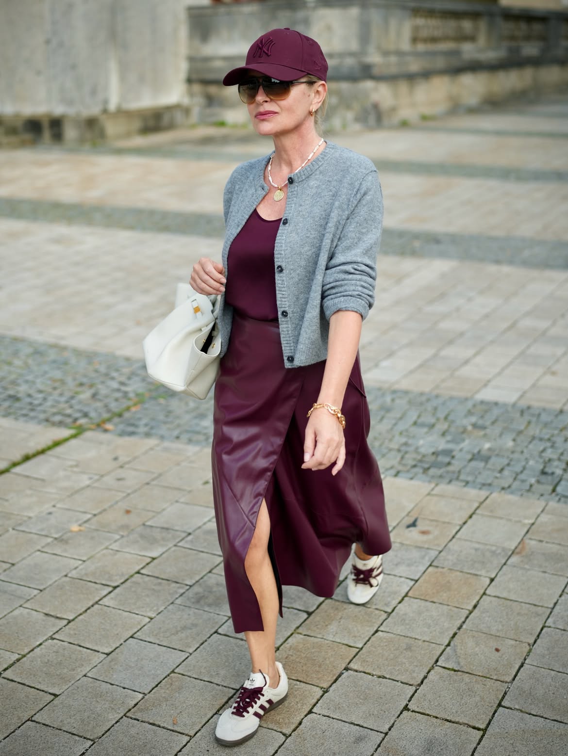 Burgundy Faux Leather Skirt With Cardigan and Sneakers