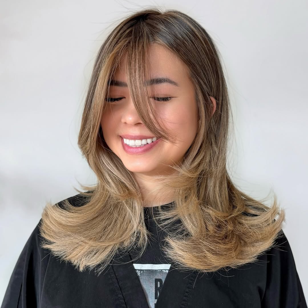 Caramel And Blonde Balayage Medium Length Layers