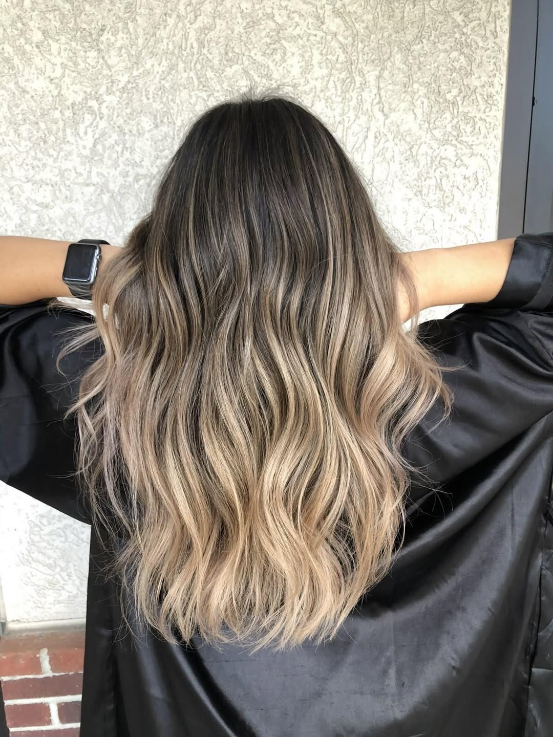Caramel Blonde Balayage On Wavy Long Layers