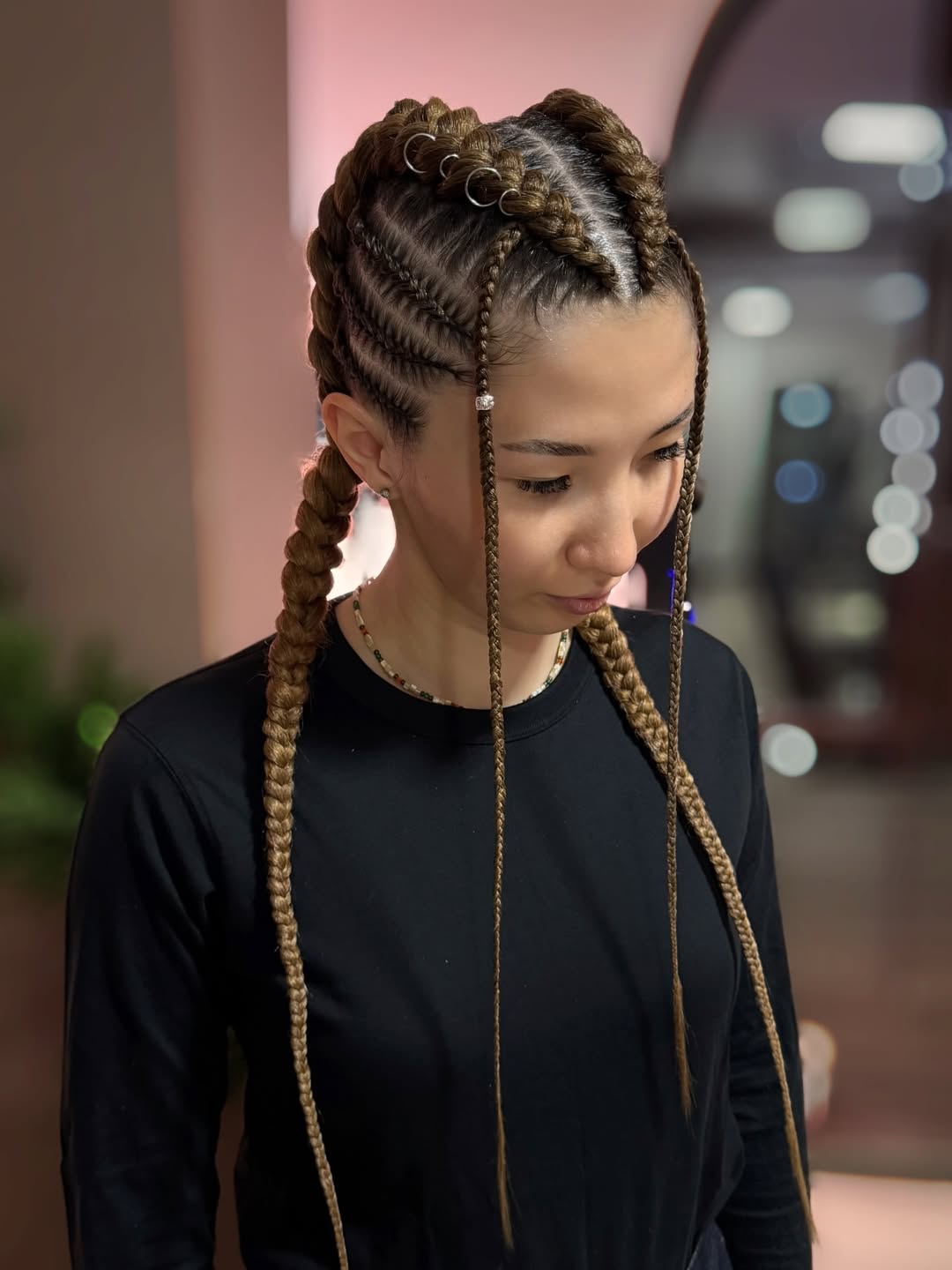 Chic Cornrow Braids With Metallic Rings