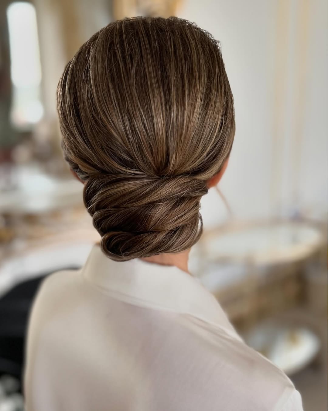 Chic Low Bun With Subtle Highlights