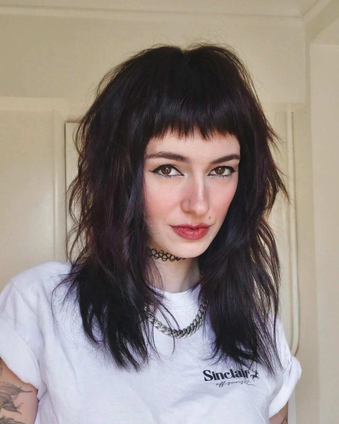Choppy Micro Bangs With Dark Shag Haircut