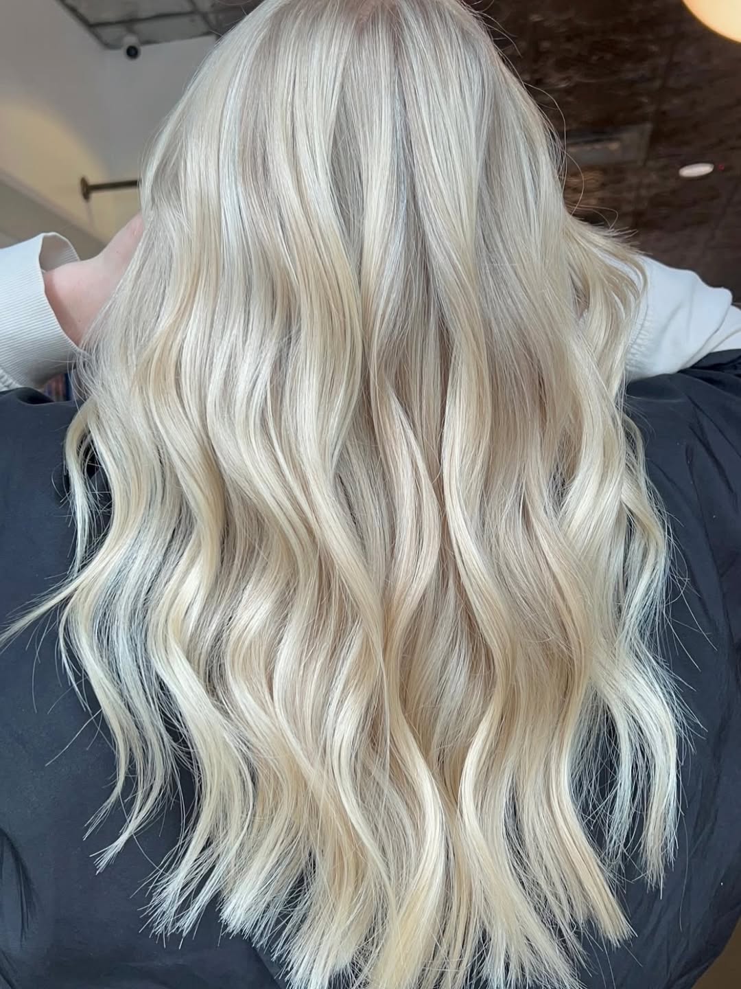 Cool Blonde Waves With Subtle Shadow Root