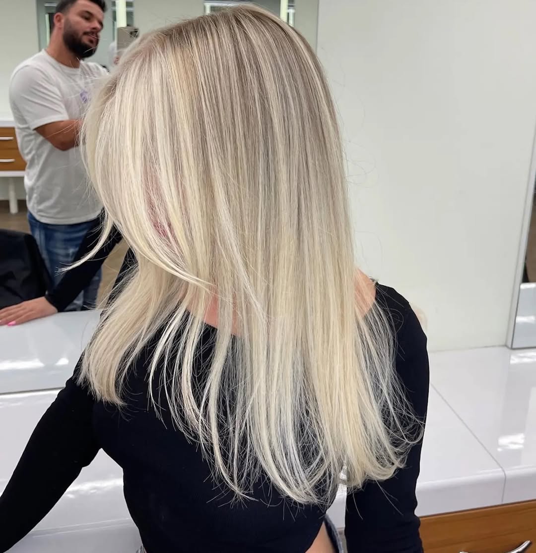 Cool Platinum Balayage With Face Framing Layers