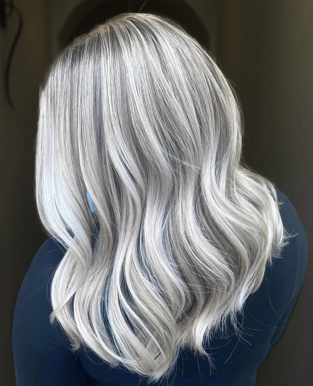 Cool Platinum Blonde Waves With Shadow Root
