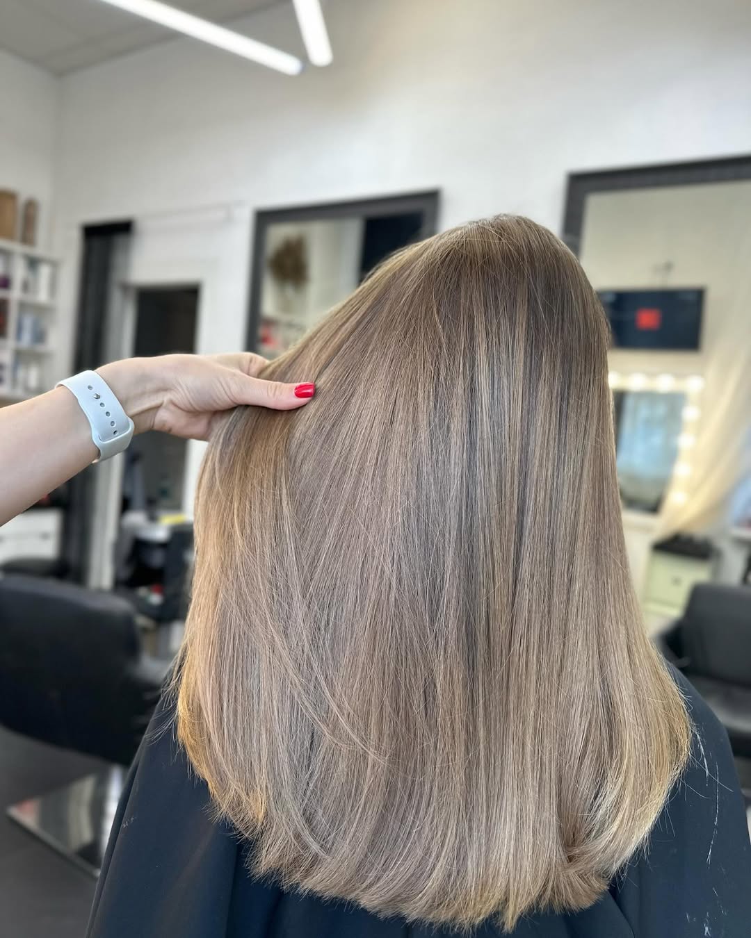 Cool-Toned Dark Blonde with Subtle Face-Framing Layers