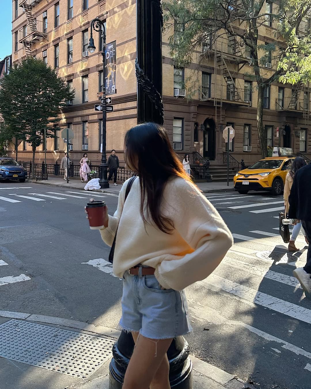 Cozy Cream Sweater With Distressed Denim Shorts