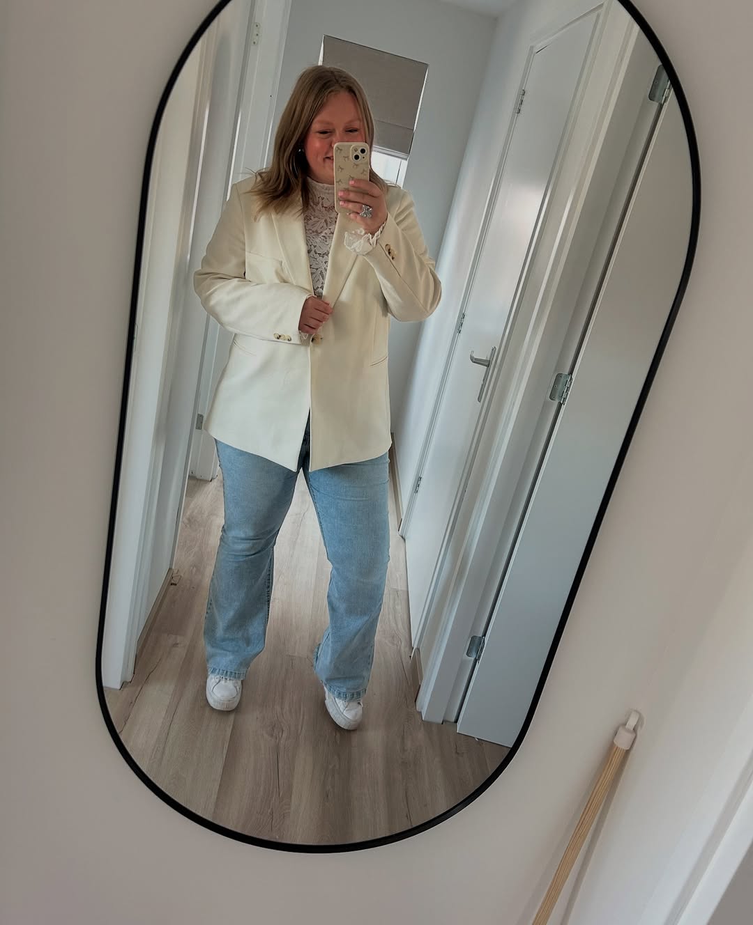 Cream Blazer Over Lace Top And Wide Leg Jeans