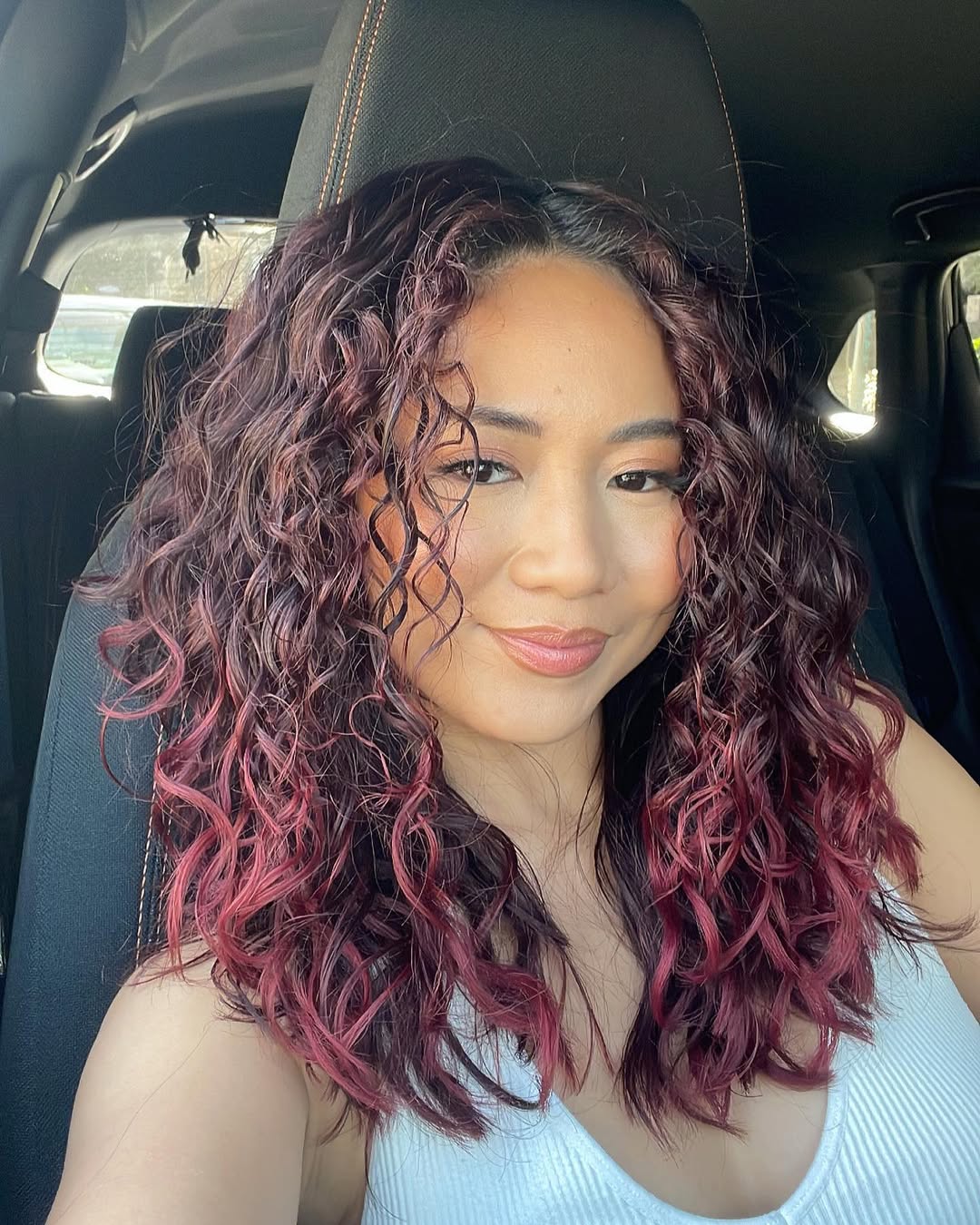 Crimson And Berry Curly Mid-Length Hair