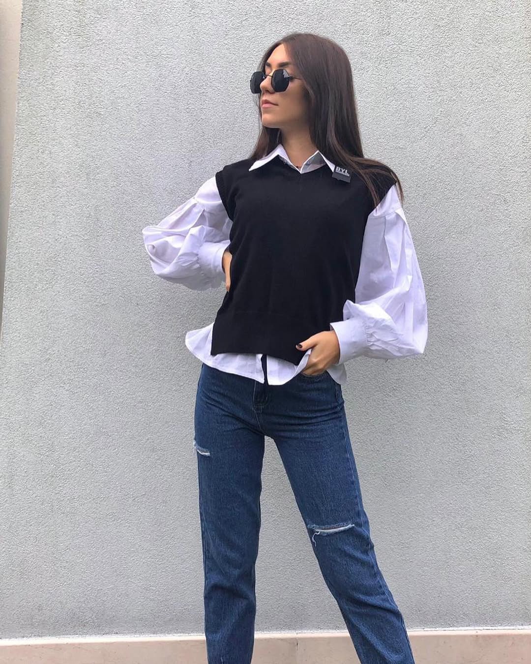 Crisp Shirt Layered With V-Neck Vest And Ripped Jeans