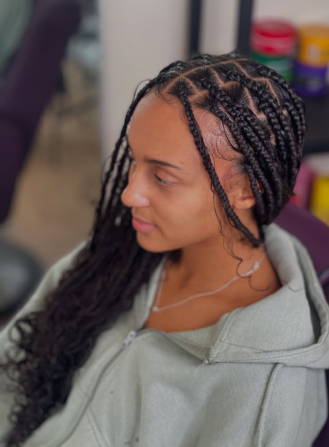 Defined Box Braids With Curly Ends And Laid Edges
