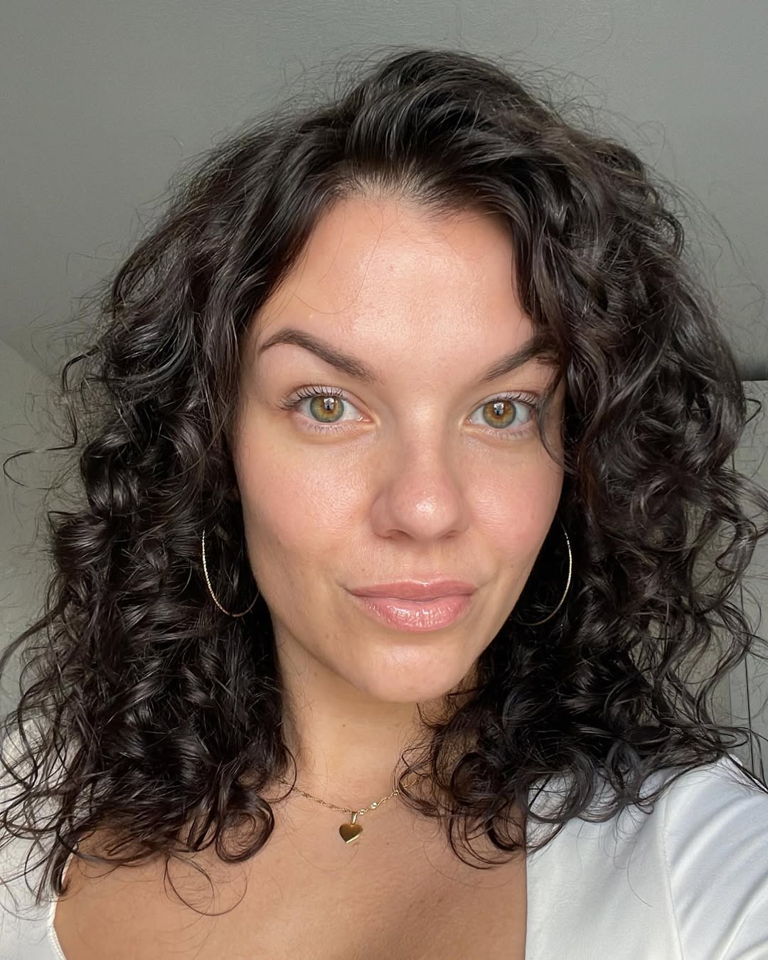 Defined Dark Curly Lob With Side Part