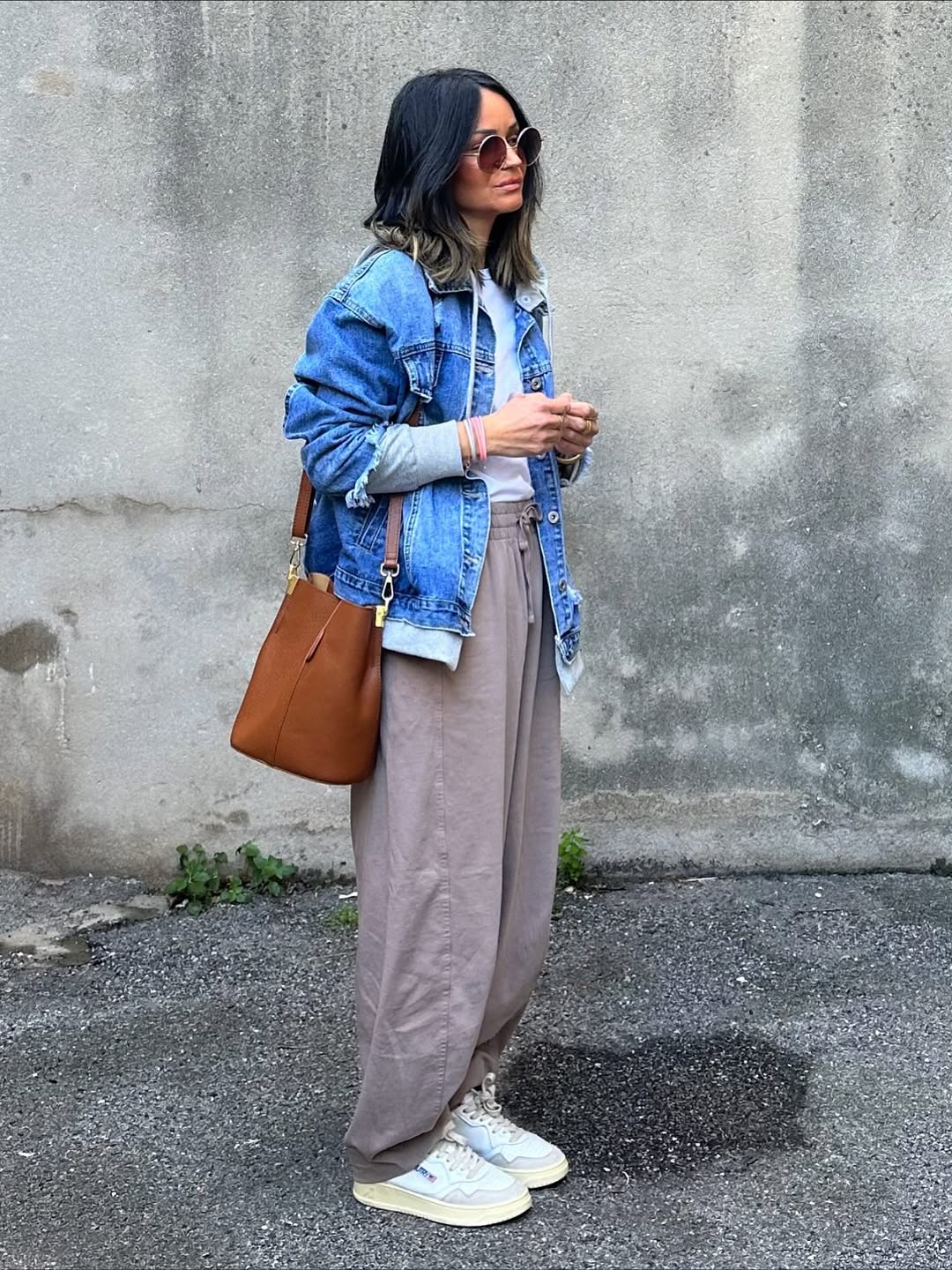 Denim Jacket Layered Over Hoodie With Wide Leg Pants