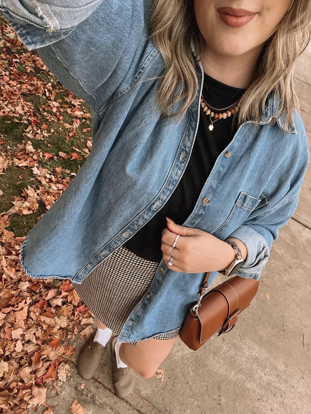 Denim Layering With Gingham Skirt And Saddle Bag