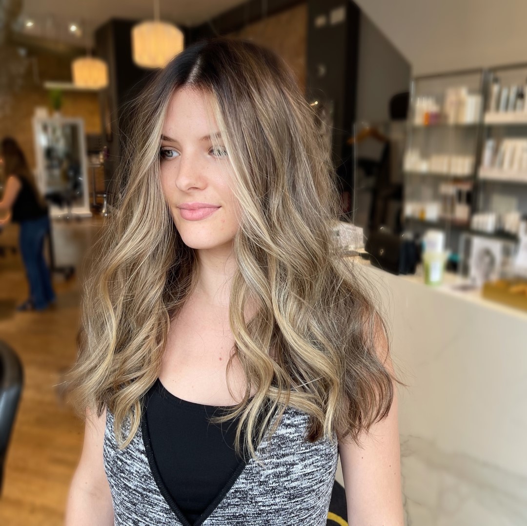 Dimensional Ash Blonde Balayage with Wavy Layers