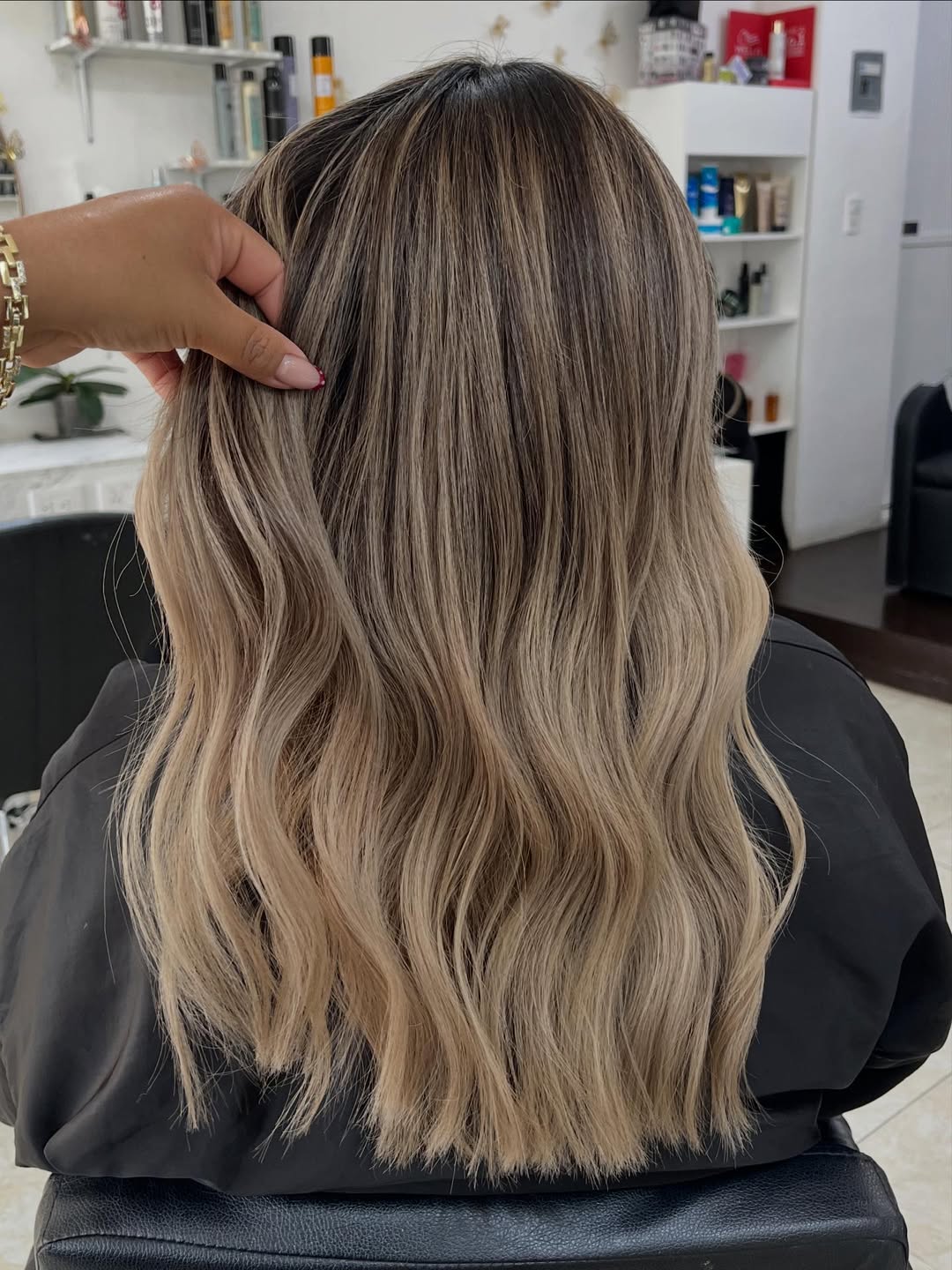 Dimensional Blonde Balayage with Soft Waves
