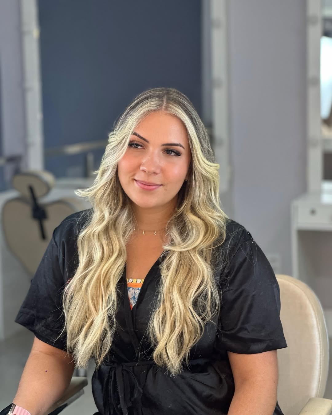Dimensional Blonde Waves With Face Framing Highlights