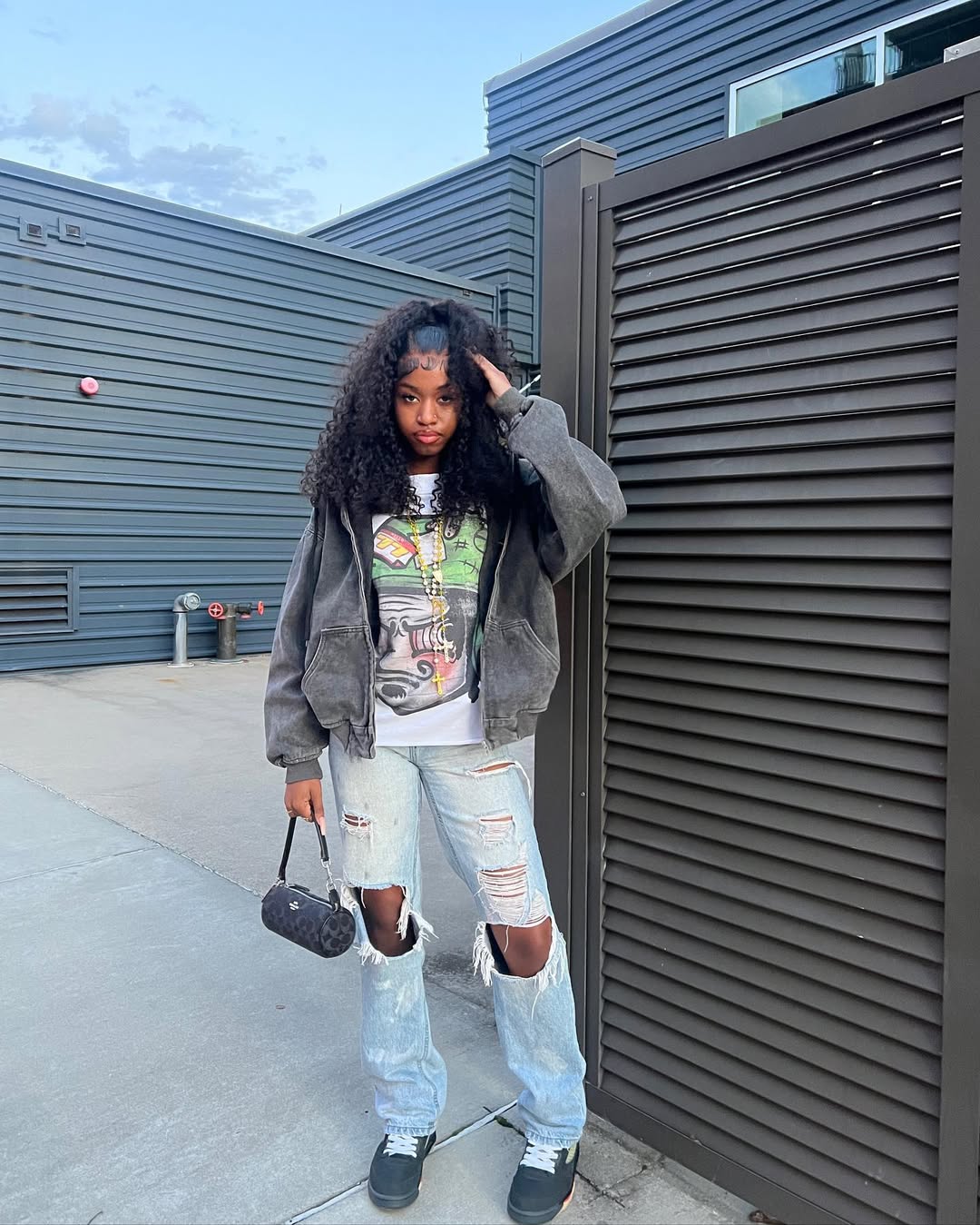 Distressed Denim & Oversized Hoodie Street Style