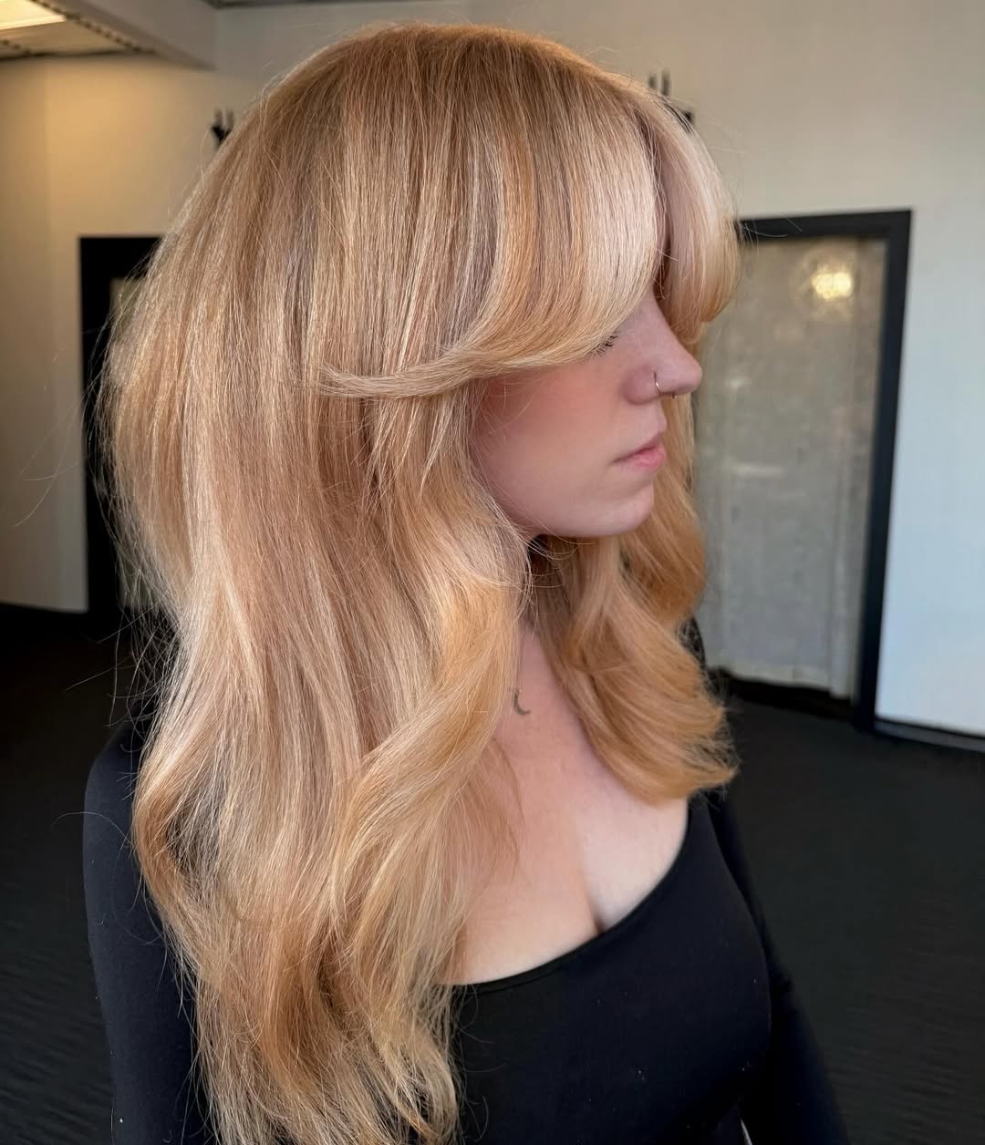 Dreamy Strawberry Blonde Waves With Face-Framing Layers