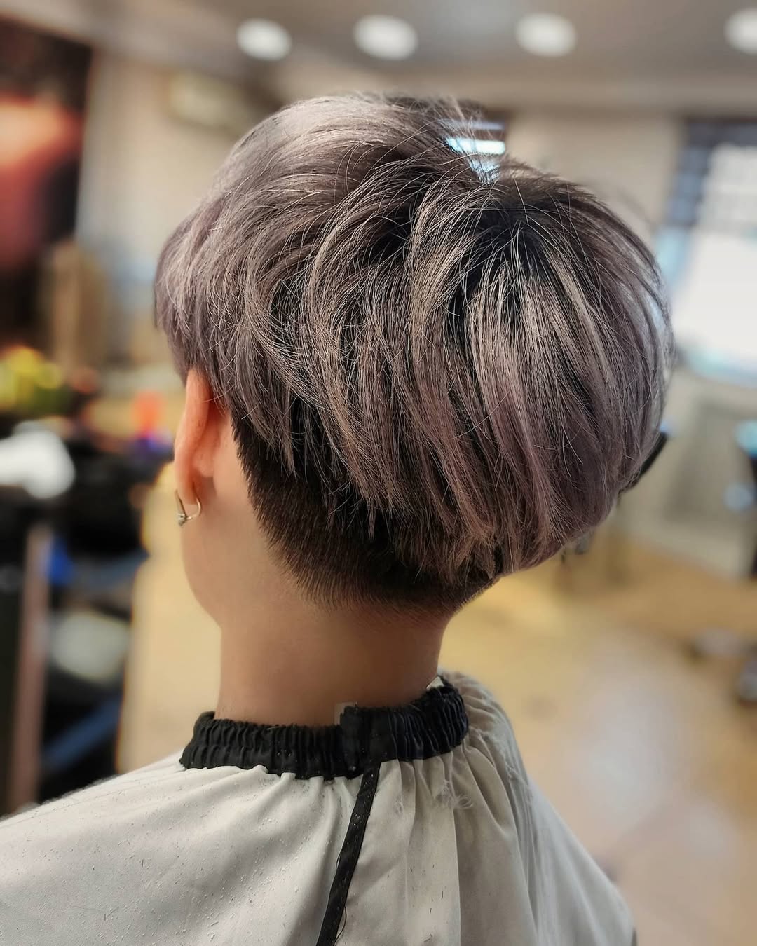 Edgy Asymmetrical Pixie With Lavender Hues