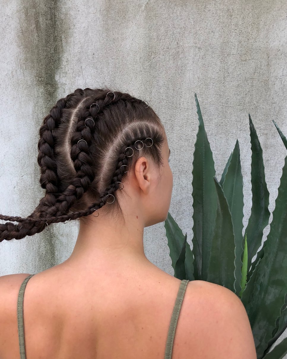 Edgy Braids Adorned With Silver Rings