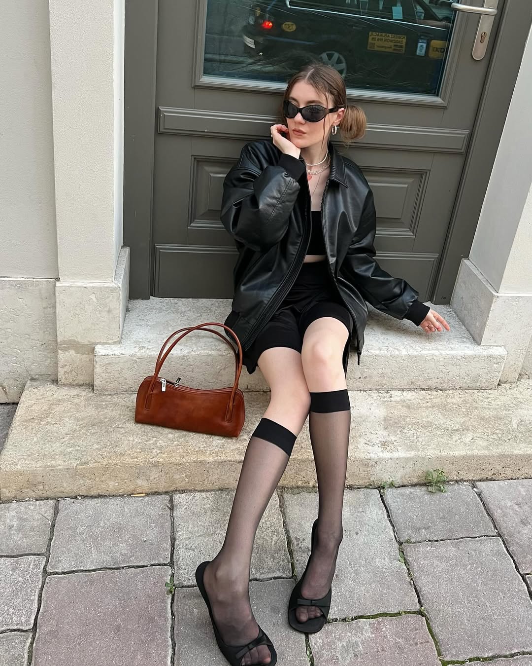 Edgy Leather Bomber And Cycling Shorts Outfit