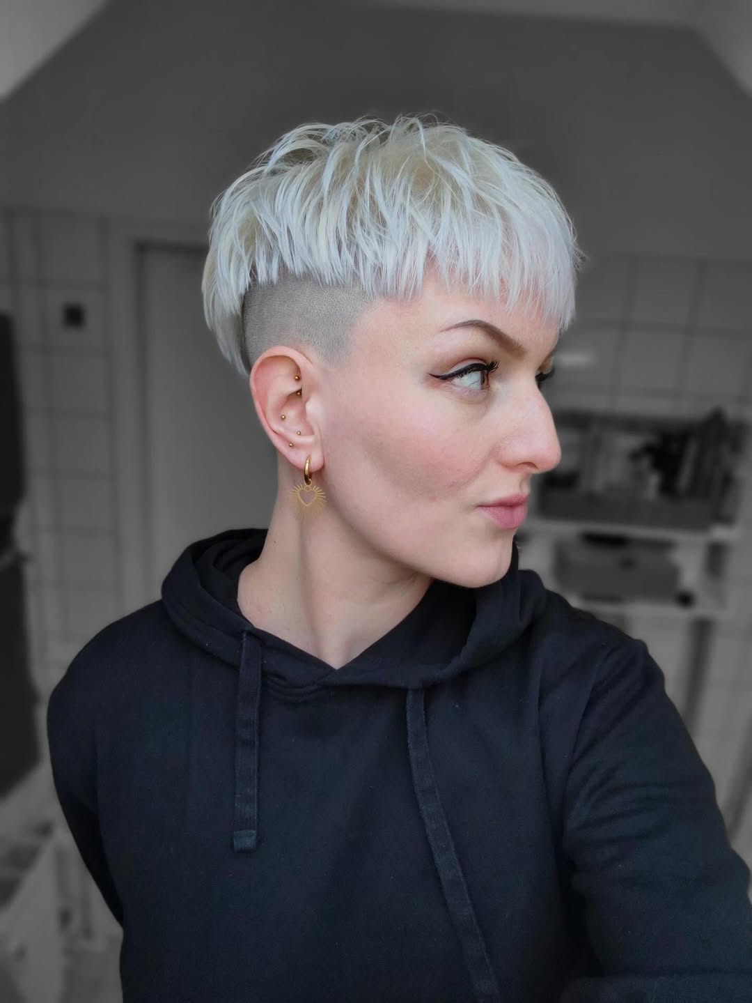 Edgy Platinum Pixie With Undercut
