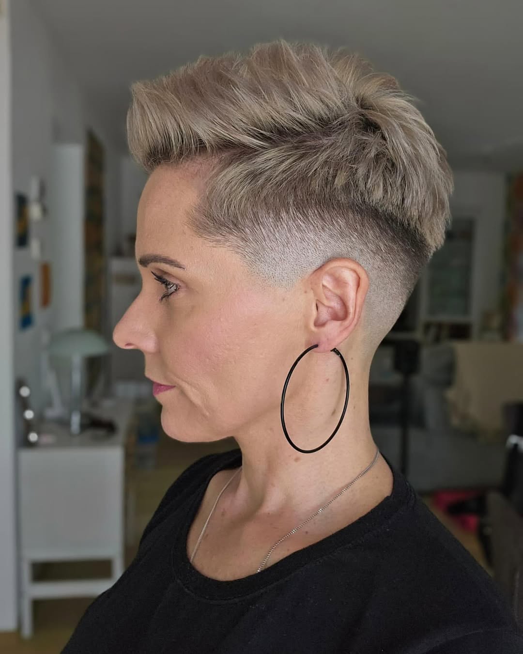 Edgy Tapered Platinum Pixie With Volume