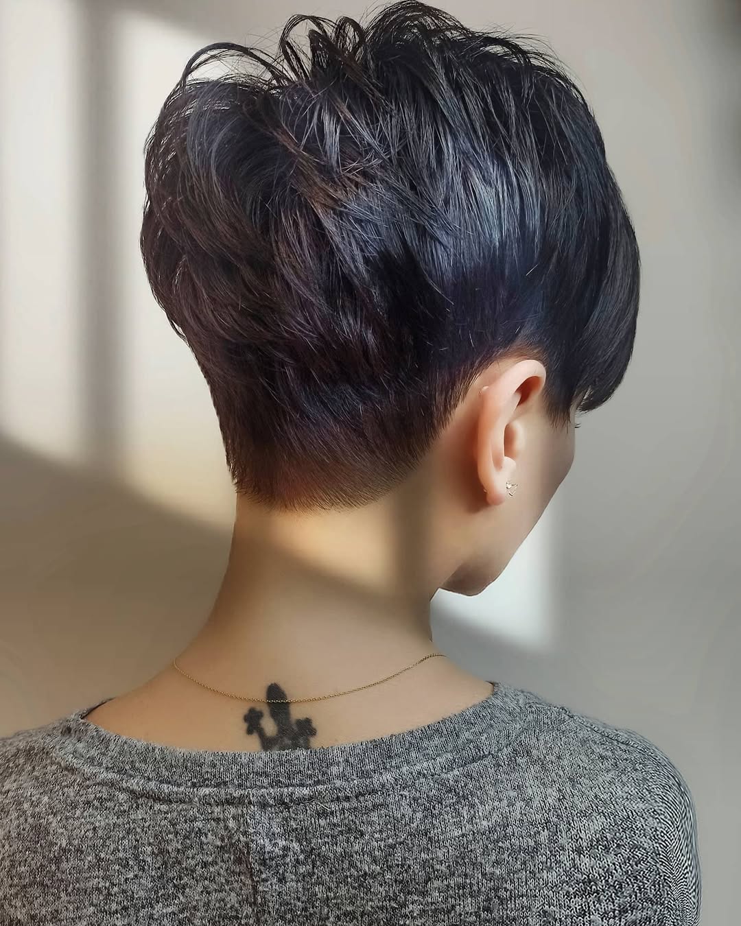 Edgy Violet Undercut Pixie With Textured Top