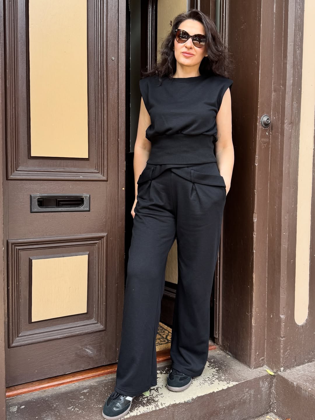 Effortless Black Wide-Leg Jumpsuit And Sneaker Combo