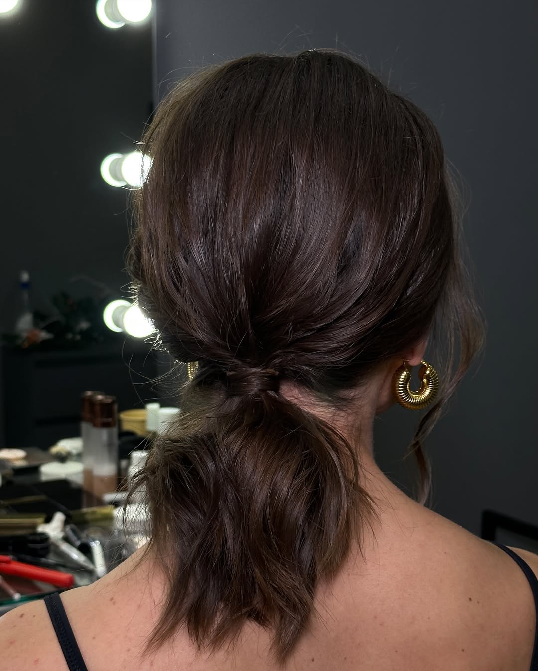 Effortless Low Knotted Ponytail With Subtle Texture
