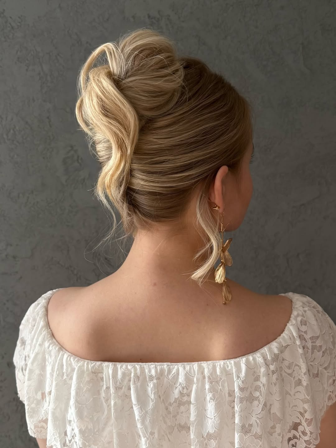 Effortless Messy Blonde Updo for Summer Vibes