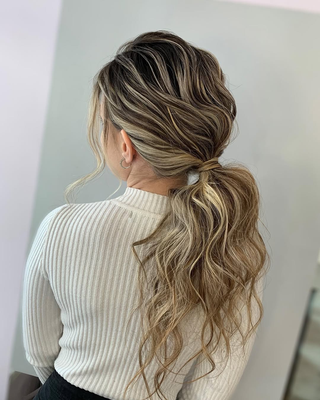 Effortless Messy Low Ponytail Blonde Highlights