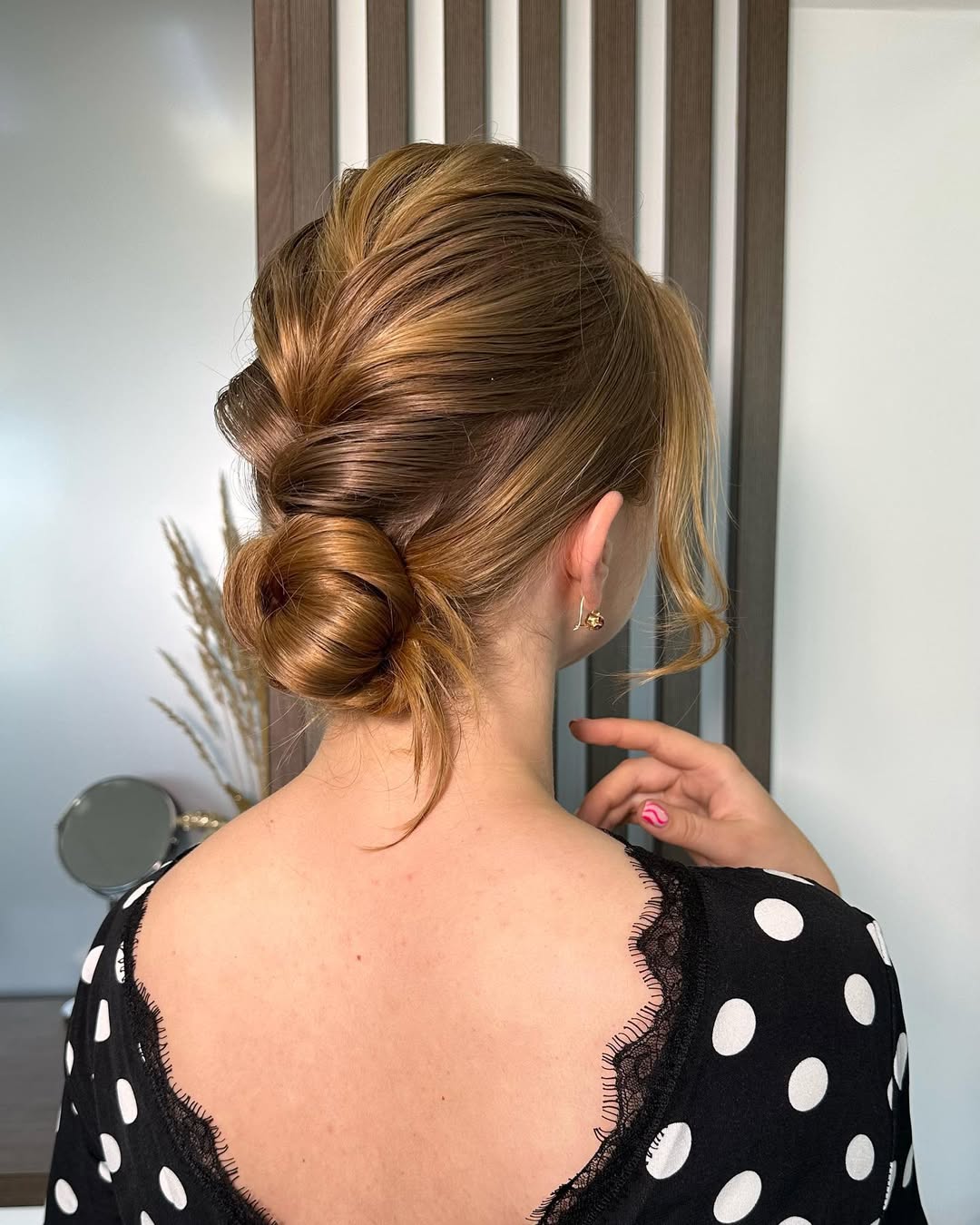 Effortless Twisted Updo With Face-Framing Tendrils