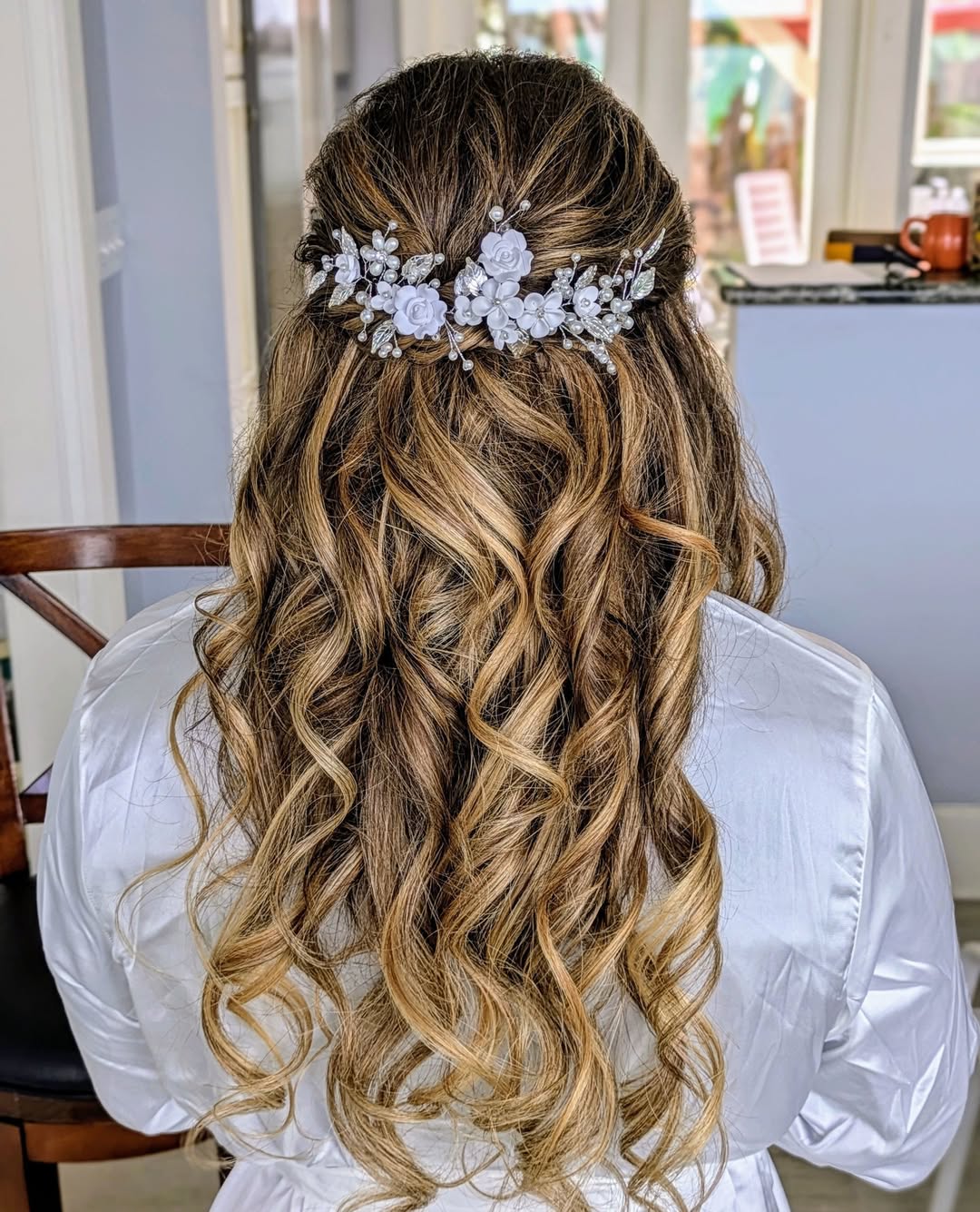 Elegant Half-Up Curls With Floral Hairpiece