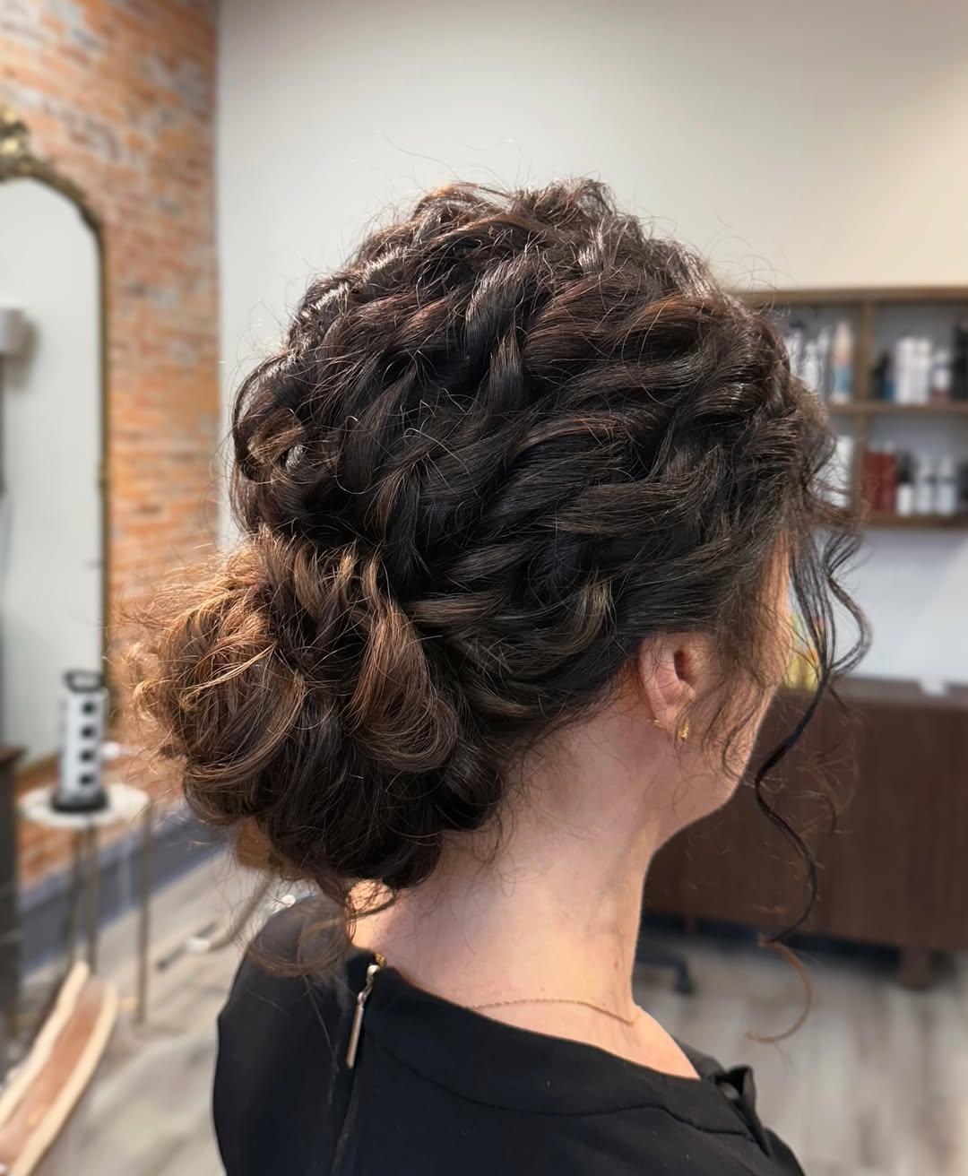 Elegant Textured Curly Updo With Face-Framing Tendrils