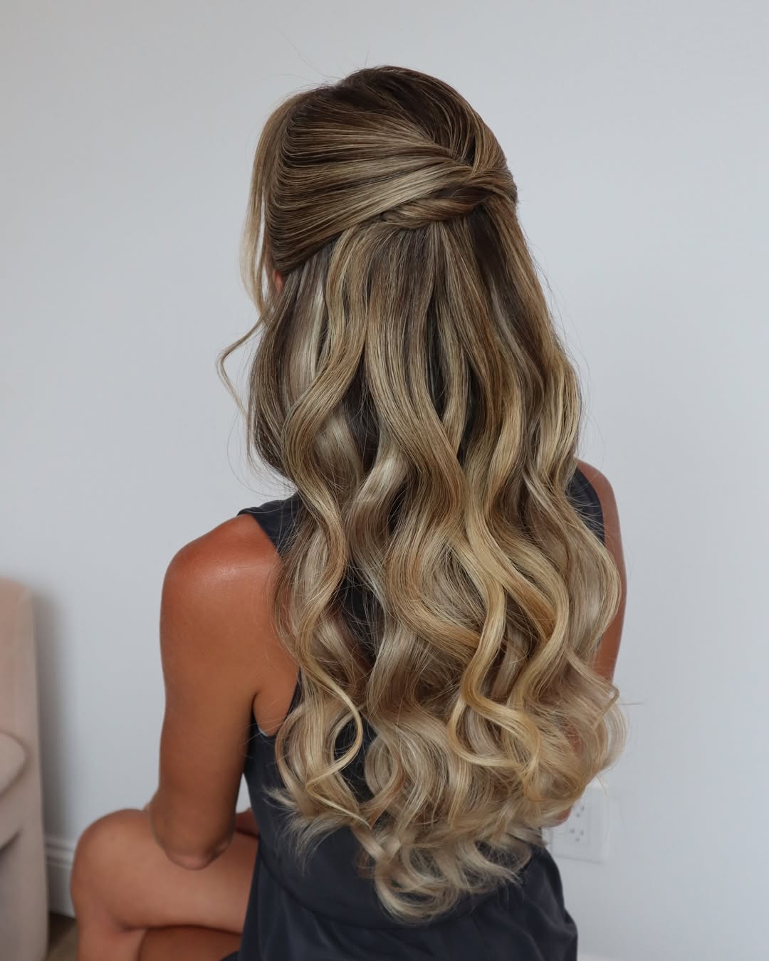 Elegant Twisted Half-Up With Loose Waves