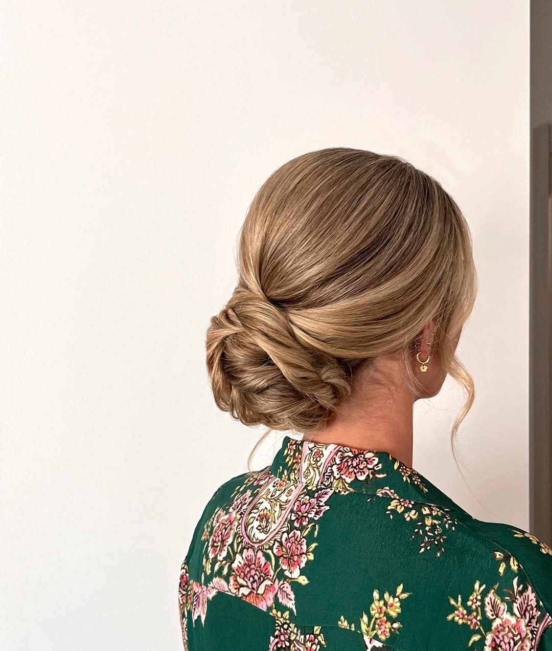 Elegant Twisted Low Bun Blonde Updo