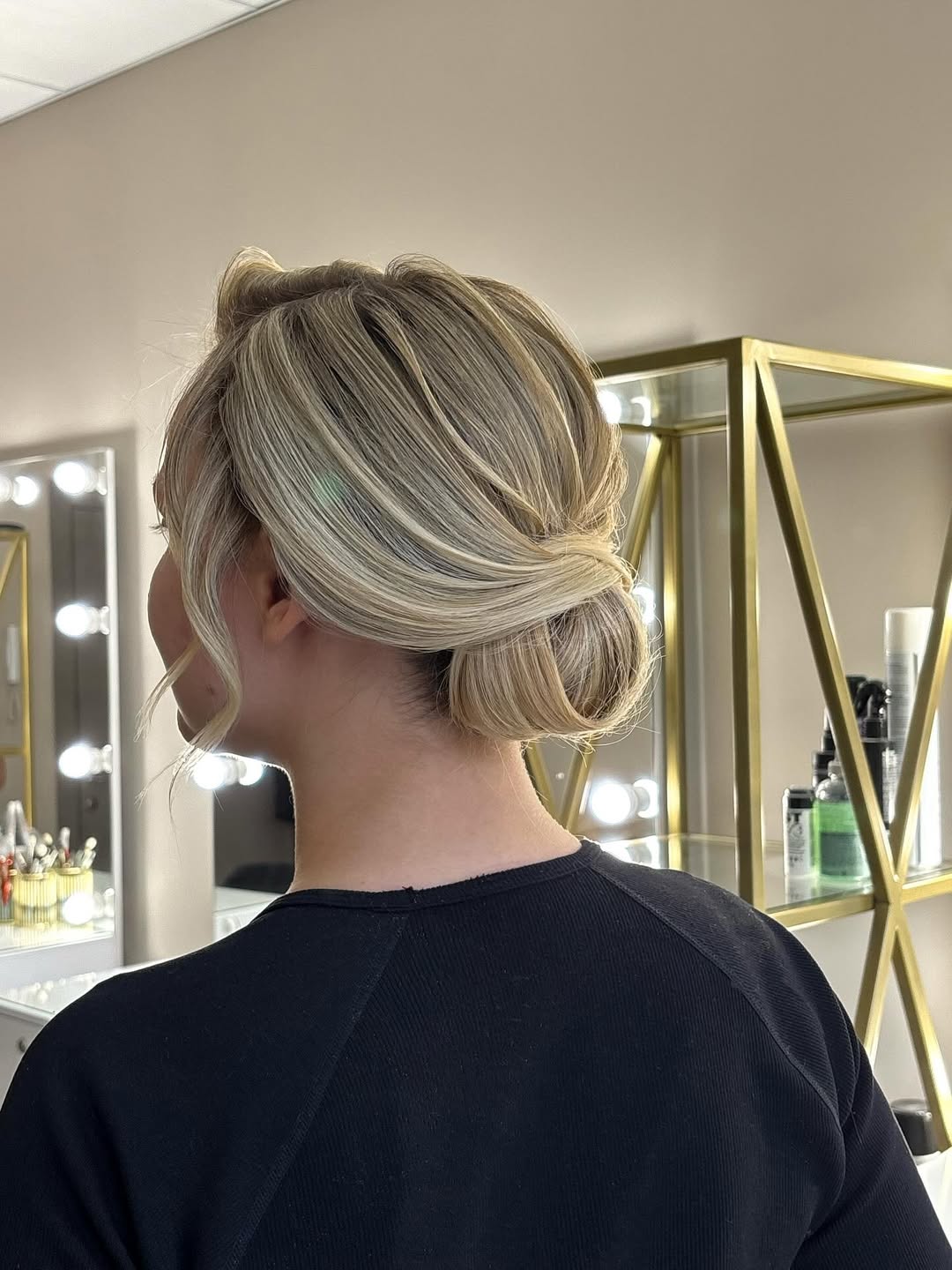 Elegant Twisted Low Bun With Face-Framing Strands