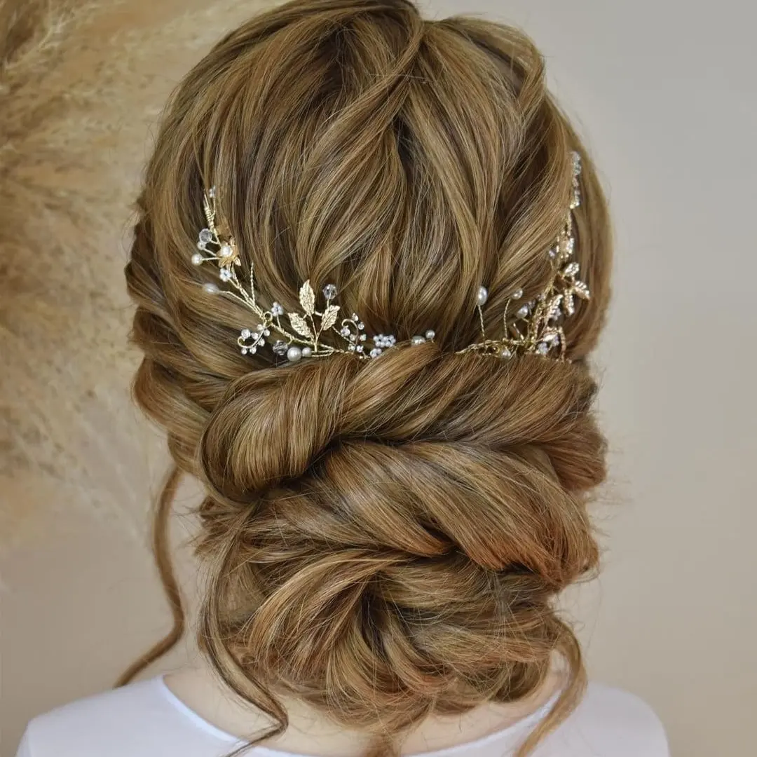 Elegant Twisted Low Bun With Gilded Hairpiece