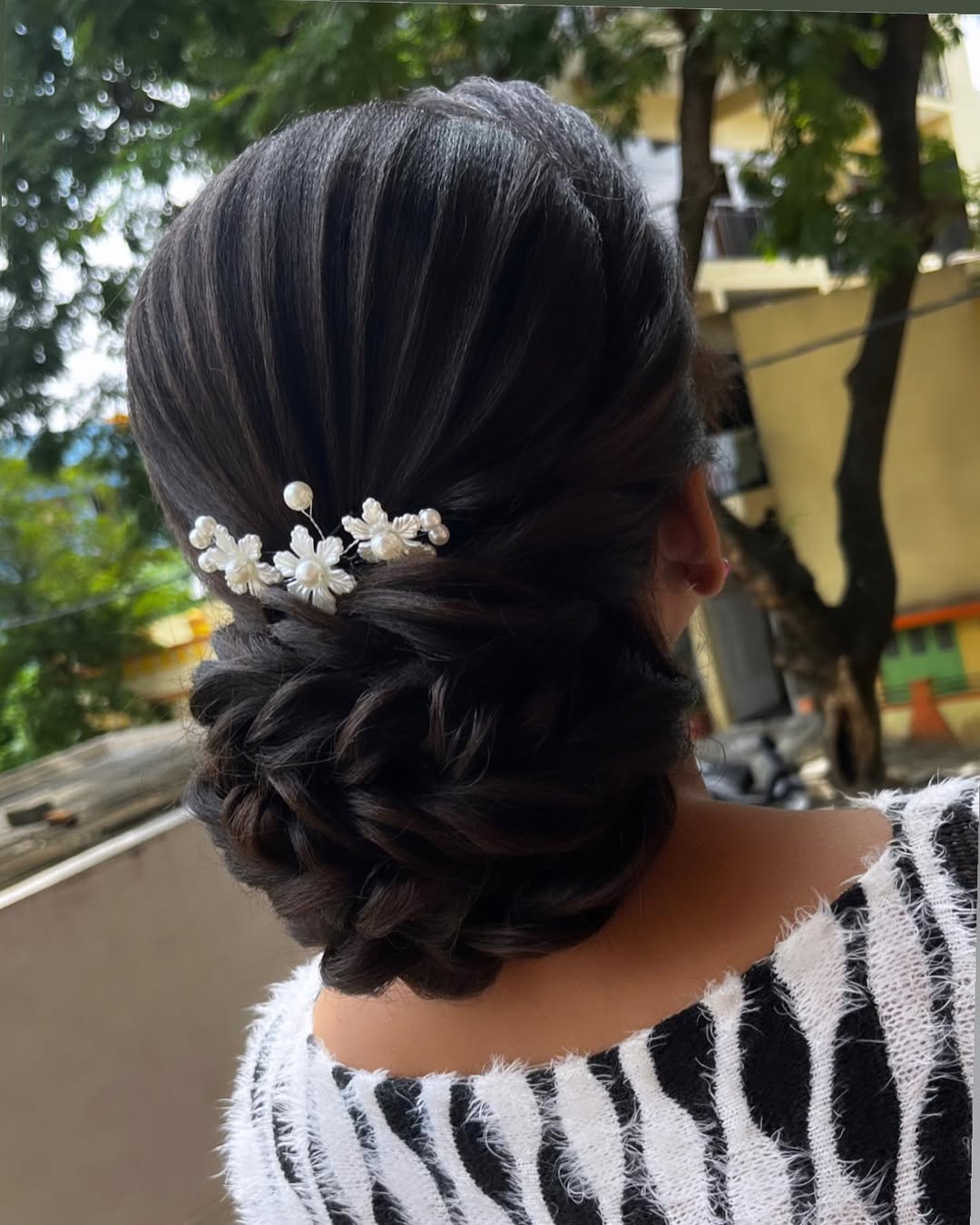 Elegant Twisted Low Bun With Pearl Hairpiece