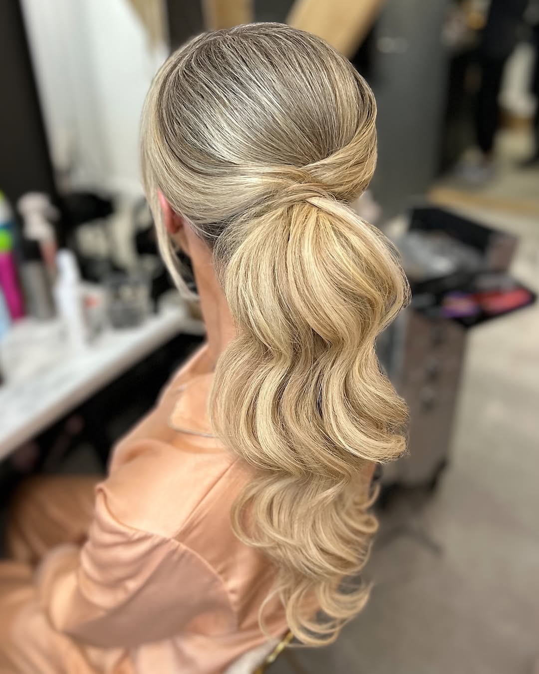 Elegant Twisted Low Ponytail With Deep Waves