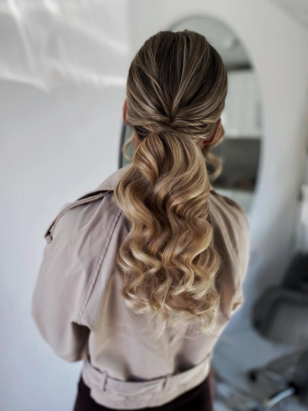 Elegant Twisted Low Ponytail With Hollywood Waves