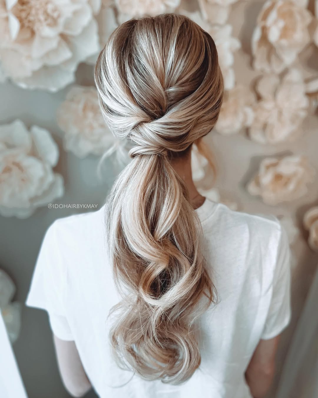 Elegant Twisted Low Ponytail With Loose Waves