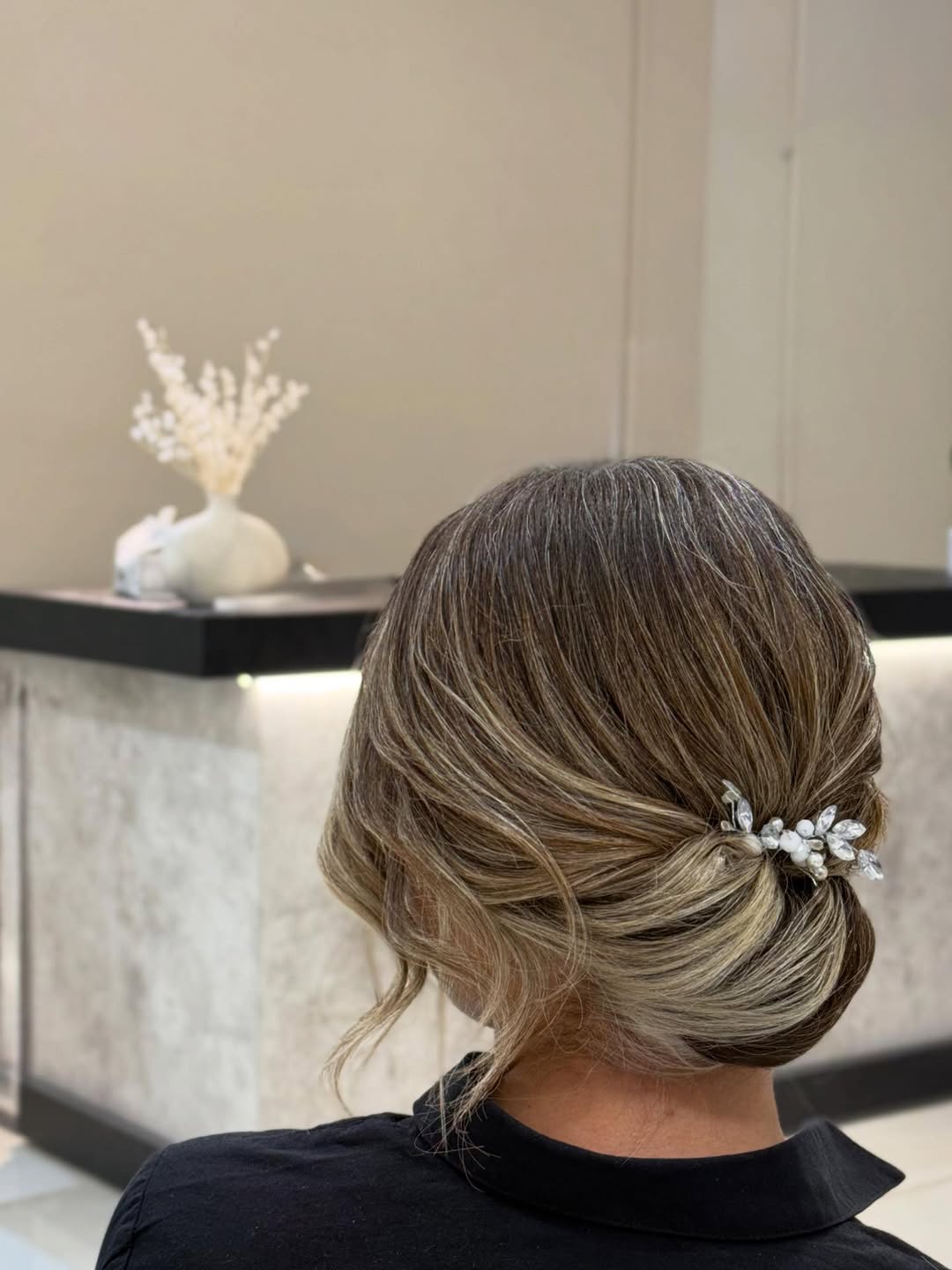 Elegant Twisted Low Updo With Blonde Highlights