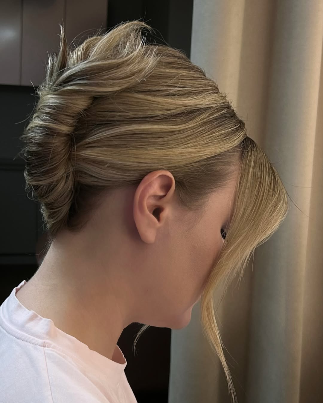 Elegant Twisted Updo With Face Framing Pieces