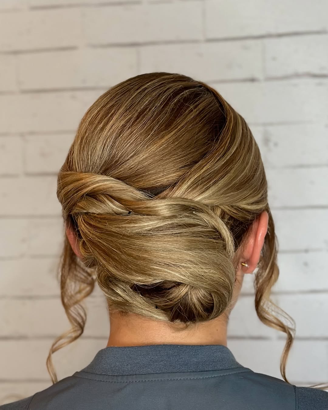 Elegant Twisted Updo With Loose Curls