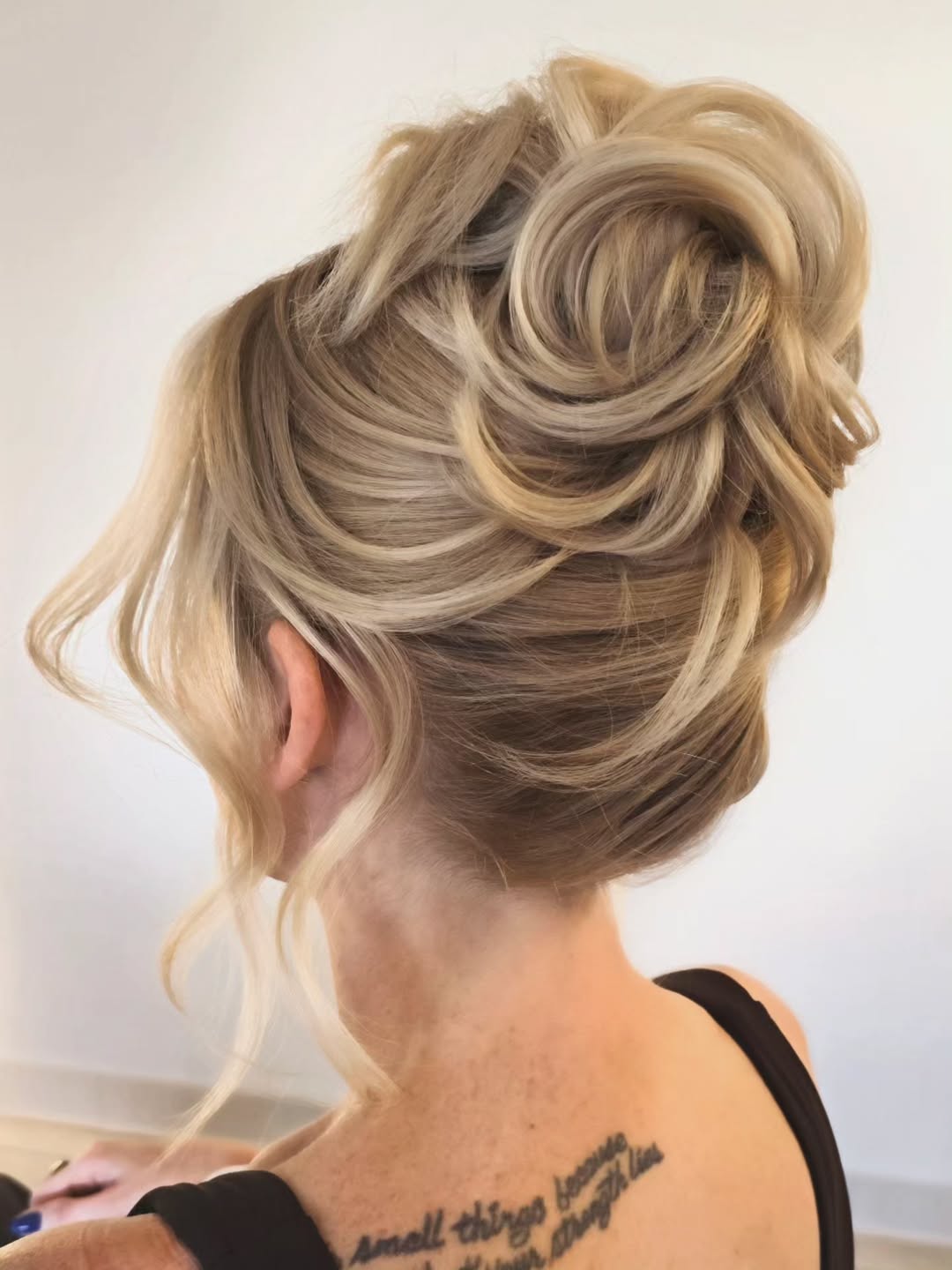 Elegant Updo With Loose Blonde Curls