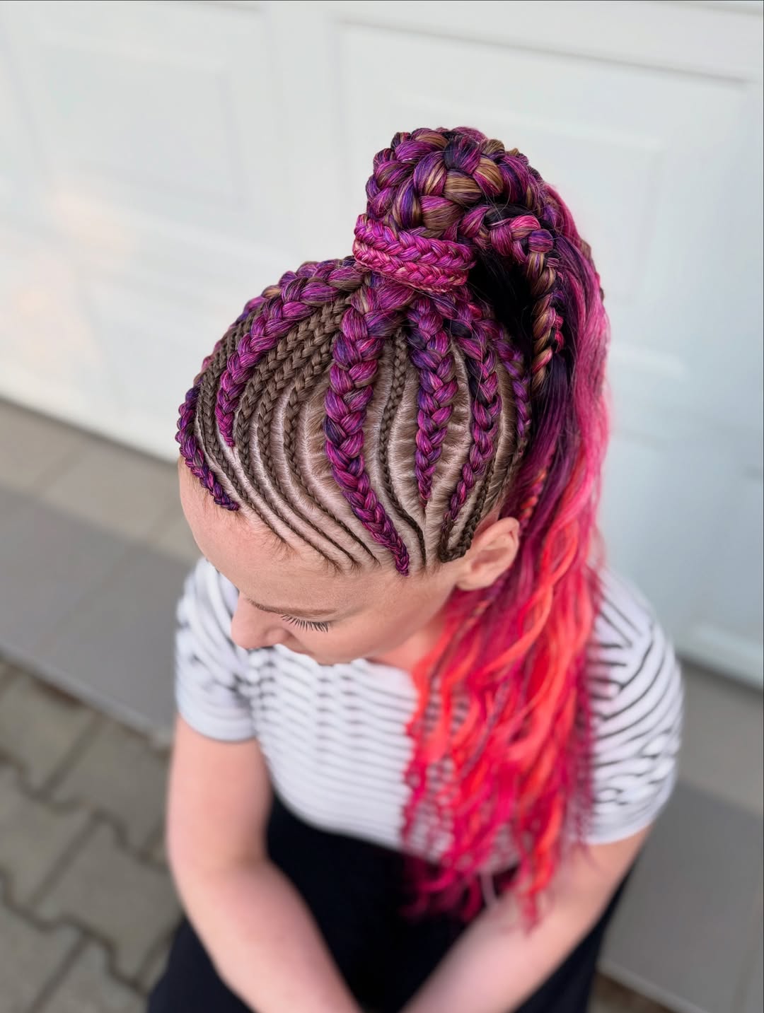 Elevated Cornrows With Vibrant Purple And Pink Strands