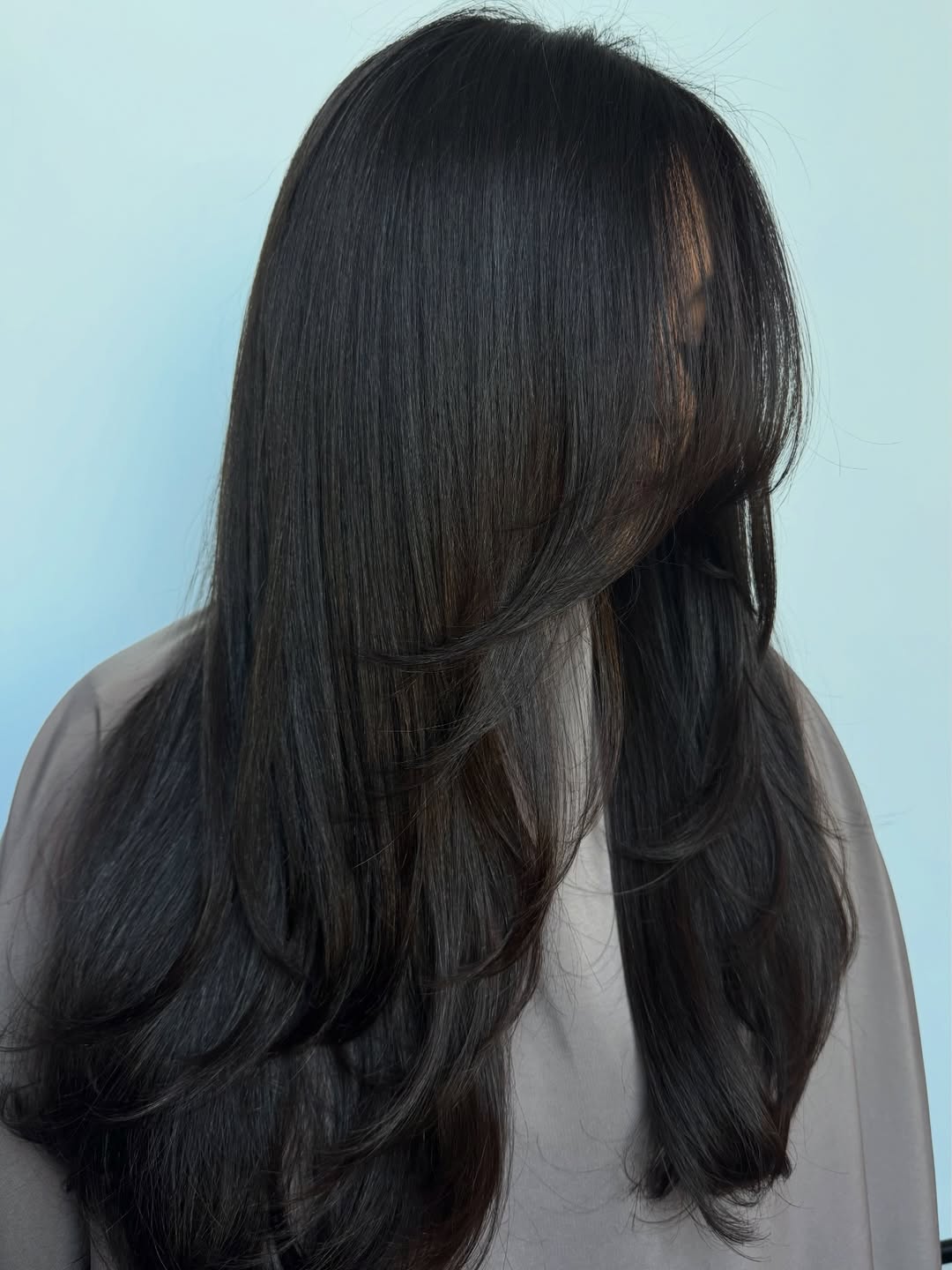 Face-Framing Layers With Subtle Shape On Dark Hair